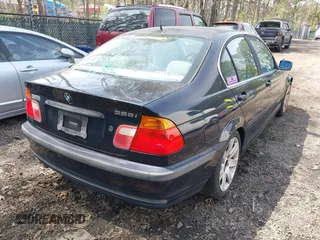 2000 BMW 3 Series 328i with VIN WBAAM5344YJR62535, listed as a IAAI auction lot 41953965 with 225,321 mi miles. Bid and sale history available at carsss.com. Image 4.