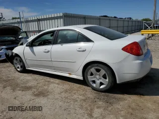 2010 Pontiac G6 1SB z VIN 1G2ZA5E00A4118557, wystawiony jako Copart lot #53303025 z przebiegiem Nie podano mil oraz Szkody całkowita. Historia ofert i sprzedaży dostępna na DreamBid. Obrazek 2.