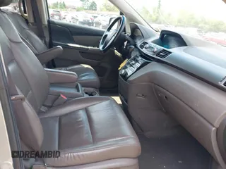 2012 Honda Odyssey EX-L with VIN 5FNRL5H67CB139701, listed as a IAAI auction lot 42233283 with 147,143 mi miles and . Bid and sale history available at DreamBid. Image 5.