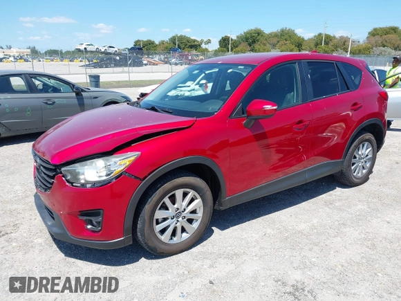 2016 Mazda CX-5 Touring with VIN JM3KE2CY6G0830409, listed as a IAAI auction lot 42049299 with 39,317 mi miles. Bid and sale history available at carsss.com. Image 17.
