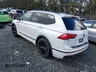 2023 Volkswagen Tiguan SE R-Line Black with VIN 3VVCB7AX3PM014446, listed as a IAAI auction lot 42016885 with 12,726 mi miles and . Bid and sale history available at DreamBid. Image 3.
