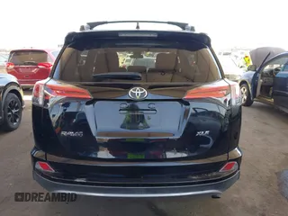 2018 Toyota RAV4 XLE with VIN 2T3WFREV2JW502622, listed as a IAAI auction lot 42327598 with 94,997 mi miles and . Bid and sale history available at DreamBid. Image 16.
