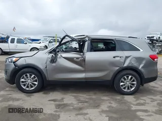 2016 Kia Sorento LX with VIN 5XYPG4A35GG149678, listed as a IAAI auction lot 41478731 with 128,895 mi miles. Bid and sale history available at carsss.com. Image 14.