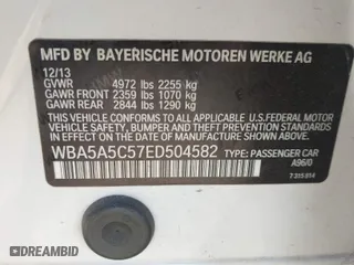 2014 BMW 5 Series 528i with VIN WBA5A5C57ED504582, listed as a IAAI auction lot 41699668 with 113,792 mi miles. Bid and sale history available at carsss.com. Image 9.