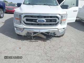 2023 Ford F-150 XL with VIN 1FTFW1E88PKD46695, listed as a IAAI auction lot 41936726 with 156,654 mi miles. Bid and sale history available at carsss.com. Image 6.