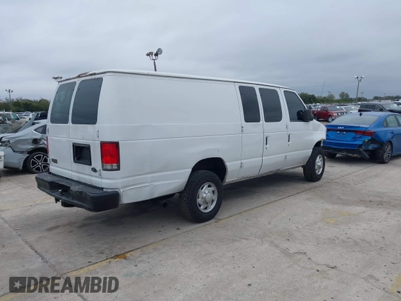 2002 Ford Econoline Cargo with VIN 1FTSS34L62HA53783, listed as a IAAI auction lot 41403058 with 306,576 mi miles and . Bid and sale history available at DreamBid. Image 4.
