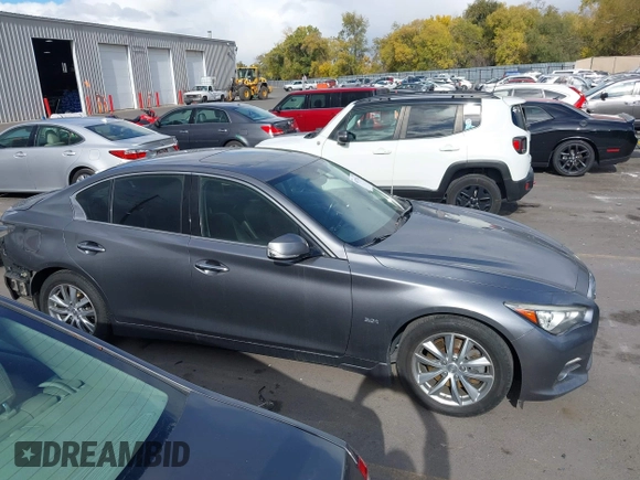 2017 Infiniti Q50 Premium with VIN JN1EV7AR2HM830032, listed as a IAAI auction lot 40777161 with 104,834 mi miles and . Bid and sale history available at DreamBid. Image 13.