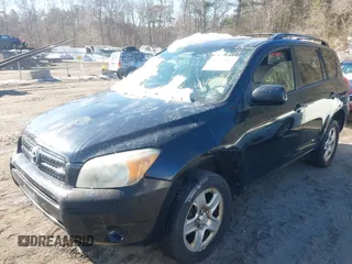 2008 Toyota RAV4 with VIN JTMBD33V985204610, listed as a IAAI auction lot 41637157 with 243,282 mi miles. Bid and sale history available at carsss.com. Image 2.