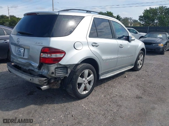 2009 Mercedes-Benz M-Class 3.5L with VIN 4JGBB86EX9A488302, listed as a IAAI auction lot 41613317 with 142,715 mi miles. Bid and sale history available at carsss.com. Image 4.
