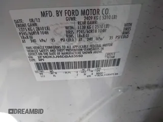 2013 Ford Edge SEL with VIN 2FMDK3J95DBA83550, listed as a IAAI auction lot 42067784 with 129,732 mi miles. Bid and sale history available at carsss.com. Image 9.