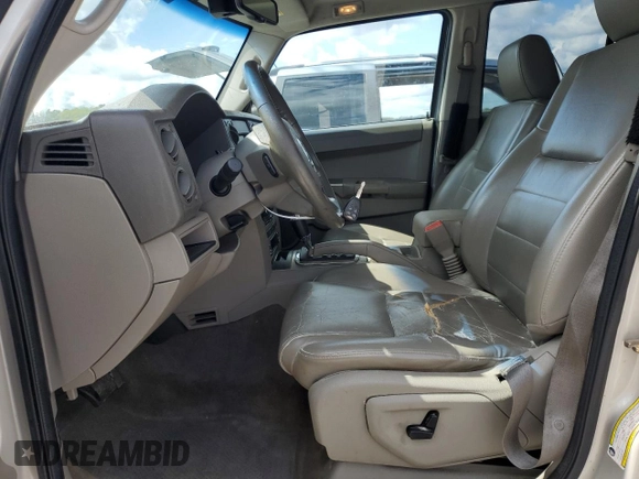 2007 Jeep Commander Sport with VIN 1J8HH48K87C501809, listed as a Copart auction lot 72325394 with 182,971 mi miles and Salvage Title. Bid and sale history available at carsss.com. Image 7.