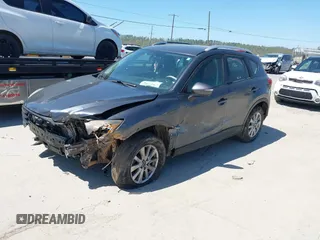 2016 Mazda CX-5 Sport with VIN JM3KE2BY2G0781565, listed as a IAAI auction lot 42042256 with 182,186 mi miles. Bid and sale history available at carsss.com. Image 18.