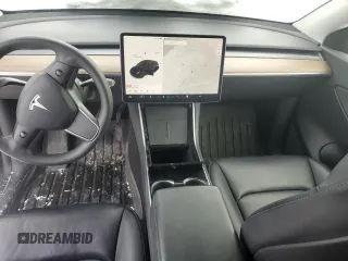 2021 Tesla Model Y Standard Range z VIN 5YJYGDED3MF120514, wystawiony jako Copart lot #46156775 z przebiegiem 93 470 mil mil oraz Szkoda całkowita • Salvage title. Historia ofert i sprzedaży dostępna na DreamBid. Obrazek 8.
