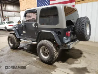 2005 Jeep Wrangler Rubicon with VIN 1J4FA69S85P368210, listed as a Copart auction lot 73425664 with 123,297 mi miles and Salvage Title. Bid and sale history available at carsss.com. Image 2.