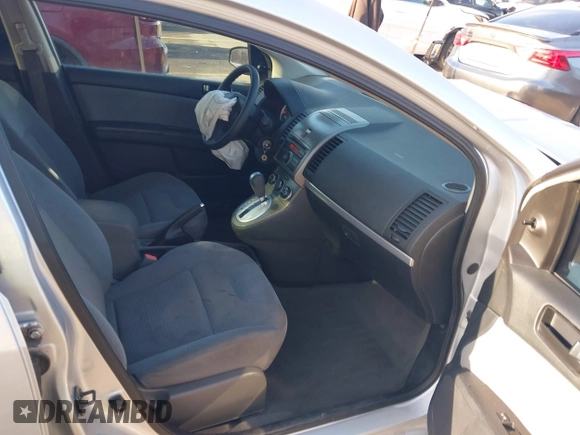 2012 Nissan Sentra S z VIN 3N1AB6AP6CL724881, wystawiony jako IAAI lot #41959859 z przebiegiem 110 858 mil mil oraz . Historia ofert i sprzedaży dostępna na DreamBid. Obrazek 5.