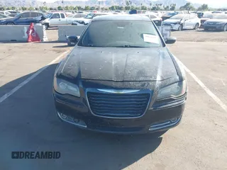 2012 Chrysler 300 S z VIN 2C3CCABG7CH143908, wystawiony jako IAAI lot #40631885 z przebiegiem 166 233 mil mil oraz . Historia ofert i sprzedaży dostępna na DreamBid. Obrazek 12.