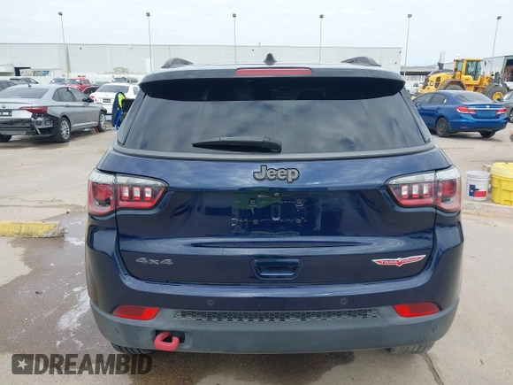 2019 Jeep Compass Trailhawk with VIN 3C4NJDDB8KT619330, listed as a IAAI auction lot 41237920 with 85,144 mi miles and . Bid and sale history available at DreamBid. Image 16.