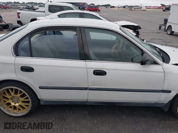 1997 Honda Civic LX z VIN 2HGEJ6676VH534795, wystawiony jako IAAI lot #42170378 z przebiegiem 228 033 mil mil oraz . Historia ofert i sprzedaży dostępna na DreamBid. Obrazek 14.