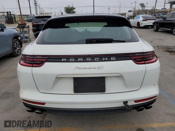 2018 Porsche Panamera с VIN WP0CB2A76JL190224, выставлен на аукционе Copart как лот 57529795 с пробегом 118 594 миль миль и Списание • Salvage title. История ставок и продаж доступна на DreamBid. Изображение 6.