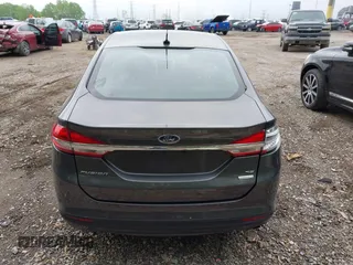 2017 Ford Fusion SE with VIN 3FA6P0HD3HR335350, listed as a IAAI auction lot 42201095 with 165,101 mi miles and . Bid and sale history available at DreamBid. Image 18.