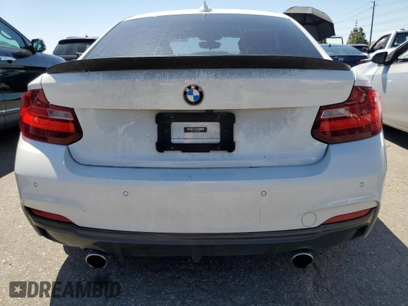 2015 BMW 2 Series 228i with VIN WBA1F9C53FVW98367, listed as a Copart auction lot 50378584 with 74,661 mi miles and Salvage Title. Bid and sale history available at carsss.com. Image 6.
