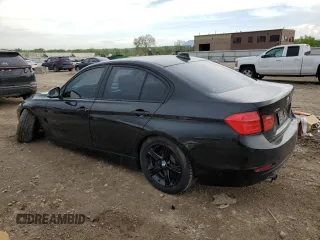 2013 BMW 3 Series 328i xDrive with VIN WBA3B3C5XDF540195, listed as a Copart auction lot 54256315 with 131,015 mi miles and Salvage title. Bid and sale history available at DreamBid. Image 2.