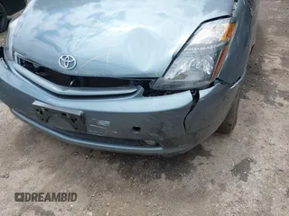 2005 Toyota Prius z VIN JTDKB20U853125464, wystawiony jako IAAI lot #42324259 z przebiegiem 166 742 mil mil oraz . Historia ofert i sprzedaży dostępna na DreamBid. Obrazek 6.