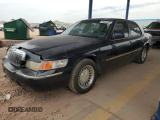 2000 Mercury Grand Marquis LS z VIN 2MEFM75W4YX664754, wystawiony jako Copart lot #56034405 z przebiegiem 228 243 mil mil oraz Szkody całkowita. Historia ofert i sprzedaży dostępna na DreamBid. Obrazek 1.