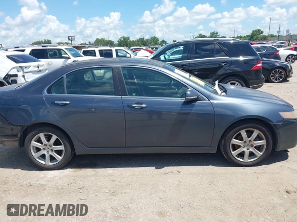 2005 Acura TSX with VIN JH4CL96805C035339, listed as a IAAI auction lot 42587430 with 212,221 mi miles and . Bid and sale history available at DreamBid. Image 14.