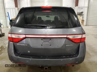 2012 Honda Odyssey Touring with VIN 5FNRL5H98CB028309, listed as a Copart auction lot 57663485 with 233,921 mi miles and Salvage title. Bid and sale history available at DreamBid. Image 6.