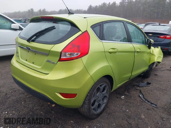 2011 Ford Fiesta SES with VIN 3FADP4FJ8BM107209, listed as a IAAI auction lot 41838522 with 142,730 mi miles. Bid and sale history available at carsss.com. Image 4.