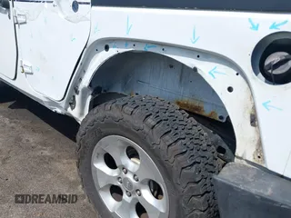 2015 Jeep Wrangler Unlimited Sahara with VIN 1C4HJWEG6FL556460, listed as a IAAI auction lot 42066648 with 54,747 mi miles. Bid and sale history available at carsss.com. Image 18.