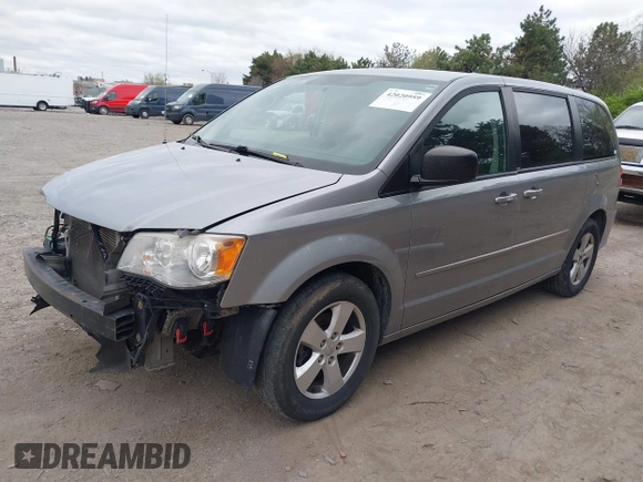 2014 Dodge Grand Caravan American Value with VIN 2C4RDGBG0ER168085, listed as a IAAI auction lot 42020959 with 213,383 mi miles and . Bid and sale history available at DreamBid. Image 2.