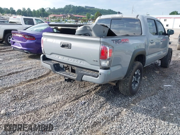 2021 Toyota Tacoma SR with VIN 5TFCZ5AN7MX255512, listed as a IAAI auction lot 42497907 with 50,563 mi miles and . Bid and sale history available at DreamBid. Image 4.
