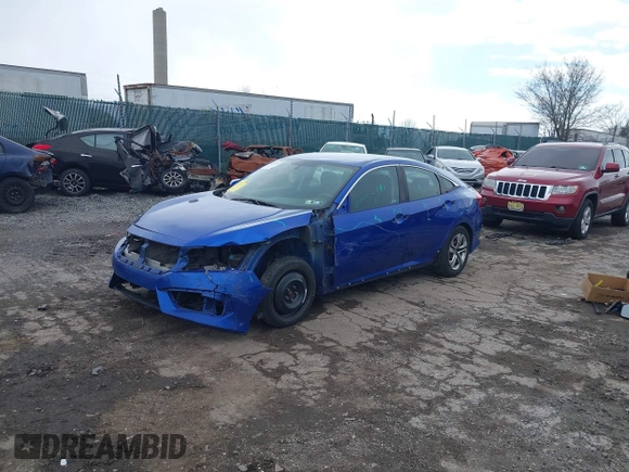 2018 Honda Civic LX with VIN 2HGFC2F59JH610350, listed as a IAAI auction lot 41892911 with 115,501 mi miles and . Bid and sale history available at DreamBid. Image 2.
