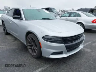 2021 Dodge Charger SXT with VIN 2C3CDXBG0MH639974, listed as a IAAI auction lot 41909193 with 15,516 mi miles. Bid and sale history available at carsss.com. Image 1.