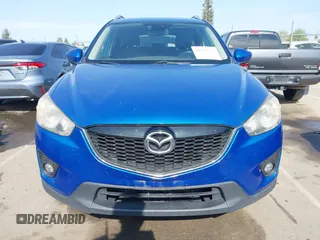 2014 Mazda CX-5 Grand Touring with VIN JM3KE4DY1E0327703, listed as a IAAI auction lot 41755735 with 206,845 mi miles. Bid and sale history available at carsss.com. Image 12.
