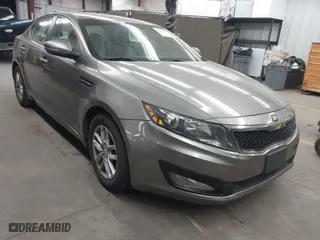 2013 Kia Optima LX with VIN 5XXGM4A72DG172671, listed as a IAAI auction lot 41915605 with 163,220 mi miles. Bid and sale history available at carsss.com. Image 1.