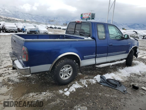 1997 Ford F-150 XL with VIN 1FTEX17LXVKB44786, listed as a Copart auction lot 49630955 with 301,736 mi miles and Salvage title. Bid and sale history available at DreamBid. Image 3.