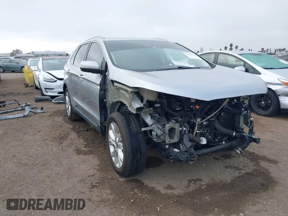 2020 Ford Edge Titanium z VIN 2FMPK4K95LBA16379, wystawiony jako IAAI lot #41190704 z przebiegiem 69 076 mil mil oraz . Historia ofert i sprzedaży dostępna na DreamBid. Obrazek 1.
