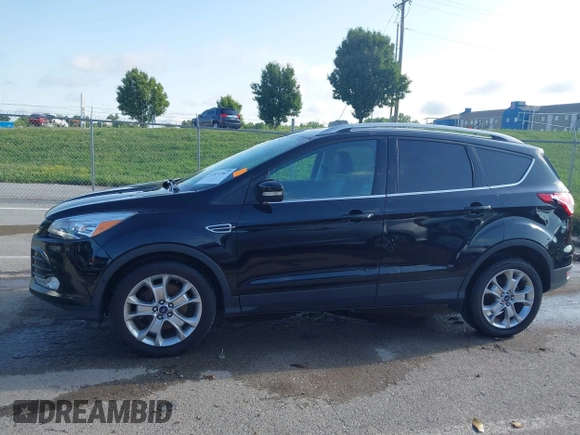 2016 Ford Escape Titanium with VIN 1FMCU9J97GUC21242, listed as a IAAI auction lot 42431567 with 96,946 mi miles and . Bid and sale history available at DreamBid. Image 14.