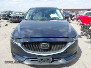 2018 Mazda CX-5 Touring with VIN JM3KFACM3J1370129, listed as a IAAI auction lot 41829027 with 71,305 mi miles. Bid and sale history available at carsss.com. Image 12.