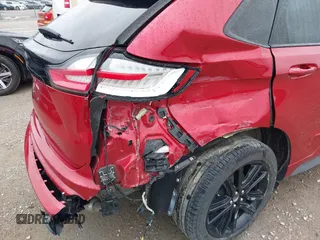 2020 Ford Edge SEL z VIN 2FMPK3J94LBB54068, wystawiony jako IAAI lot #41912225 z przebiegiem 83 528 mil mil oraz . Historia ofert i sprzedaży dostępna na DreamBid. Obrazek 6.