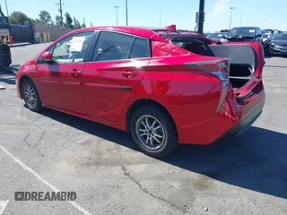 2016 Toyota Prius Four with VIN JTDKARFUXG3523023, listed as a IAAI auction lot 41754221 with 74,988 mi miles. Bid and sale history available at carsss.com. Image 3.