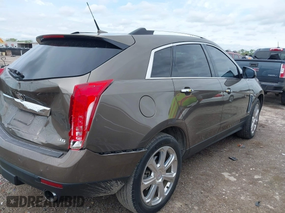 2014 Cadillac SRX Performance Collection with VIN 3GYFNCE31ES509461, listed as a IAAI auction lot 41908431 with 150,915 mi miles. Bid and sale history available at carsss.com. Image 4.