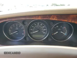 2004 Jaguar XJ with VIN SAJWA71C24SG28164, listed as a Copart auction lot 73968134 with 0 mi miles and Salvage Title. Bid and sale history available at carsss.com. Image 9.