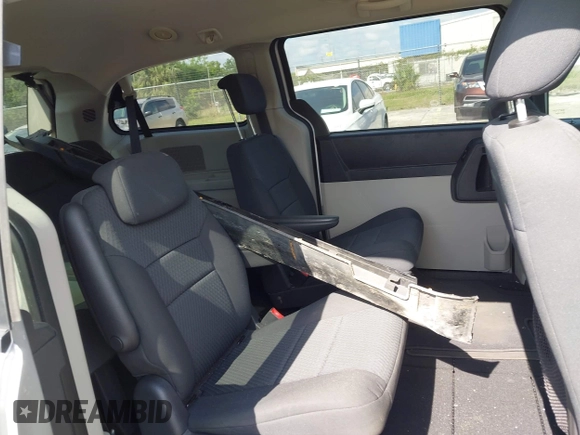 2010 Dodge Grand Caravan SE with VIN 2D4RN4DE0AR125435, listed as a IAAI auction lot 40681039 with 193,424 mi miles and . Bid and sale history available at DreamBid. Image 8.