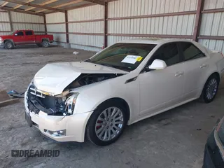 2013 Cadillac CTS Premium z VIN 1G6DS5E30D0105240, wystawiony jako IAAI lot #42145007 z przebiegiem 100 893 mil mil oraz . Historia ofert i sprzedaży dostępna na DreamBid. Obrazek 2.