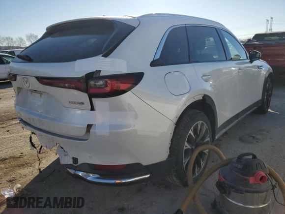 2024 Mazda CX-90 Premium Plus z VIN JM3KKEHAXR1141492, wystawiony jako Copart lot #89282925 z przebiegiem 5 424 mil mil oraz Szkoda całkowita • Salvage title. Historia ofert i sprzedaży dostępna na DreamBid. Obrazek 3.