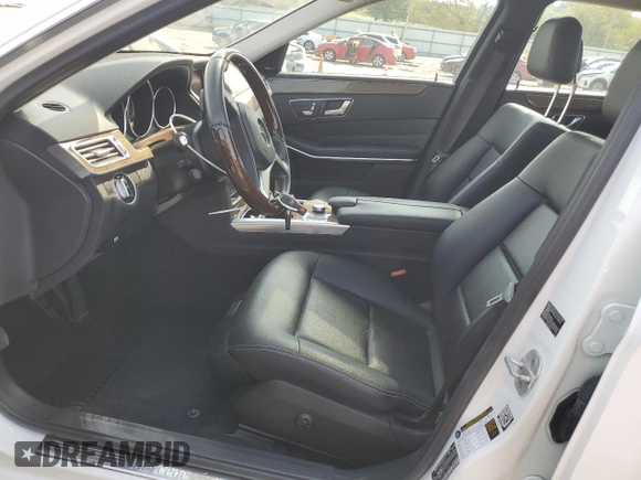 2014 Mercedes-Benz E-Class E 250 BlueTEC Luxury with VIN WDDHF0EB7EA917908, listed as a Copart auction lot 69064454 with 129,208 mi miles and Salvage Title. Bid and sale history available at carsss.com. Image 7.